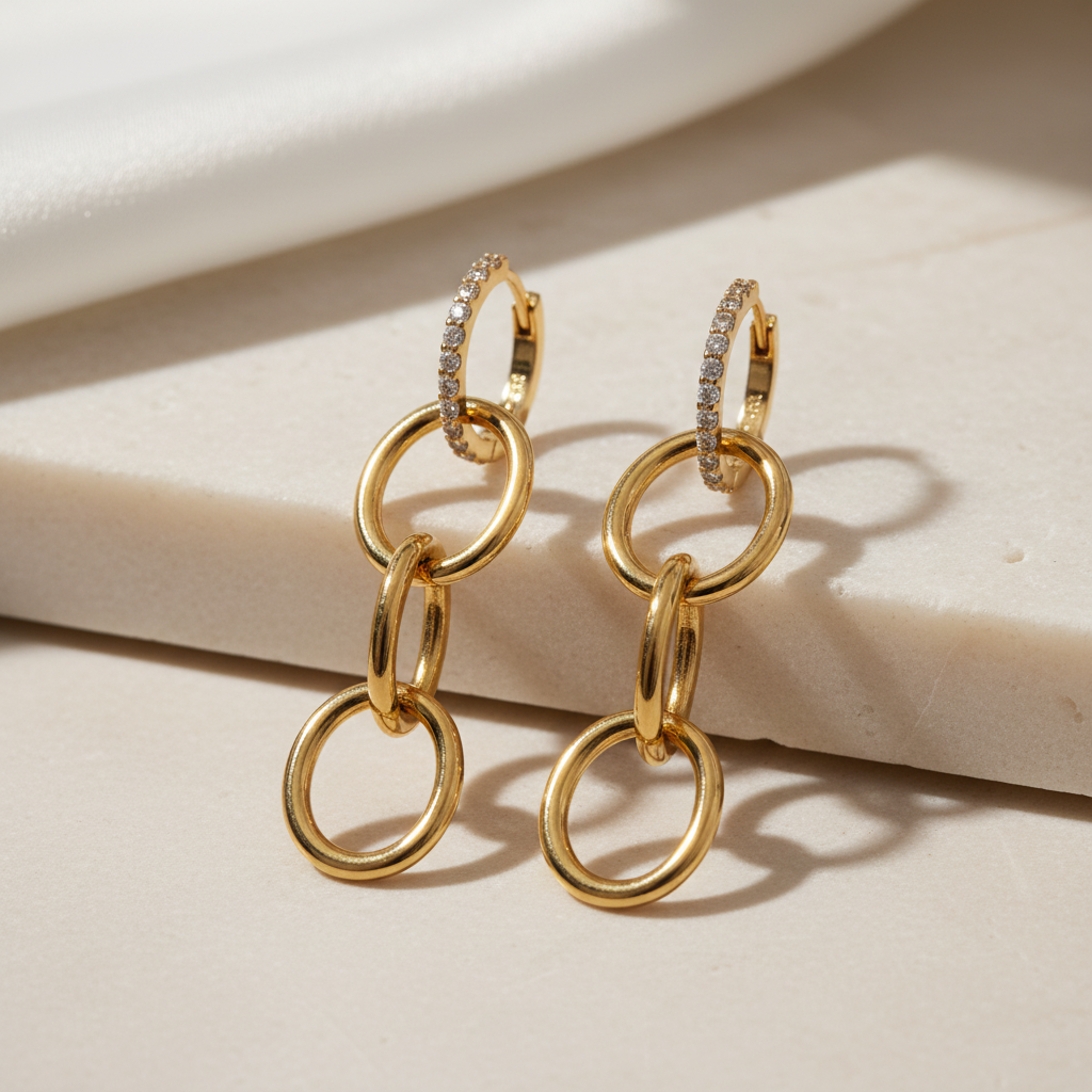 Interlock Oval Drop Studded Earrings